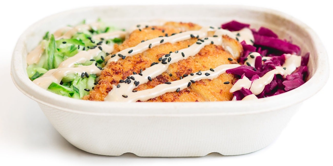 A CombiniCo katsu bowl in a compostable tray